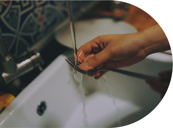 Technician installing spectrum shield system in Utah family home basement.